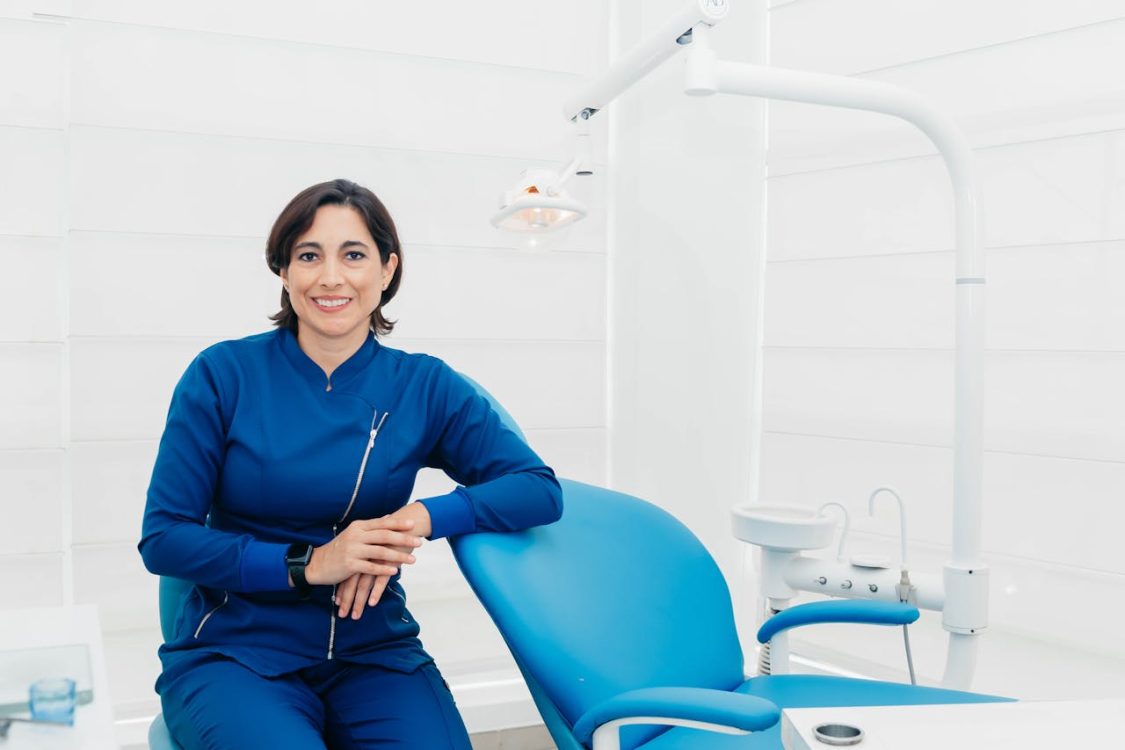 dental technician working in dental laboratory crafting dentures